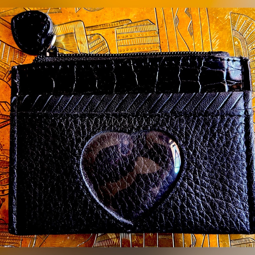 Brighton black leather card case
Photo window, front pocket
new without tags.